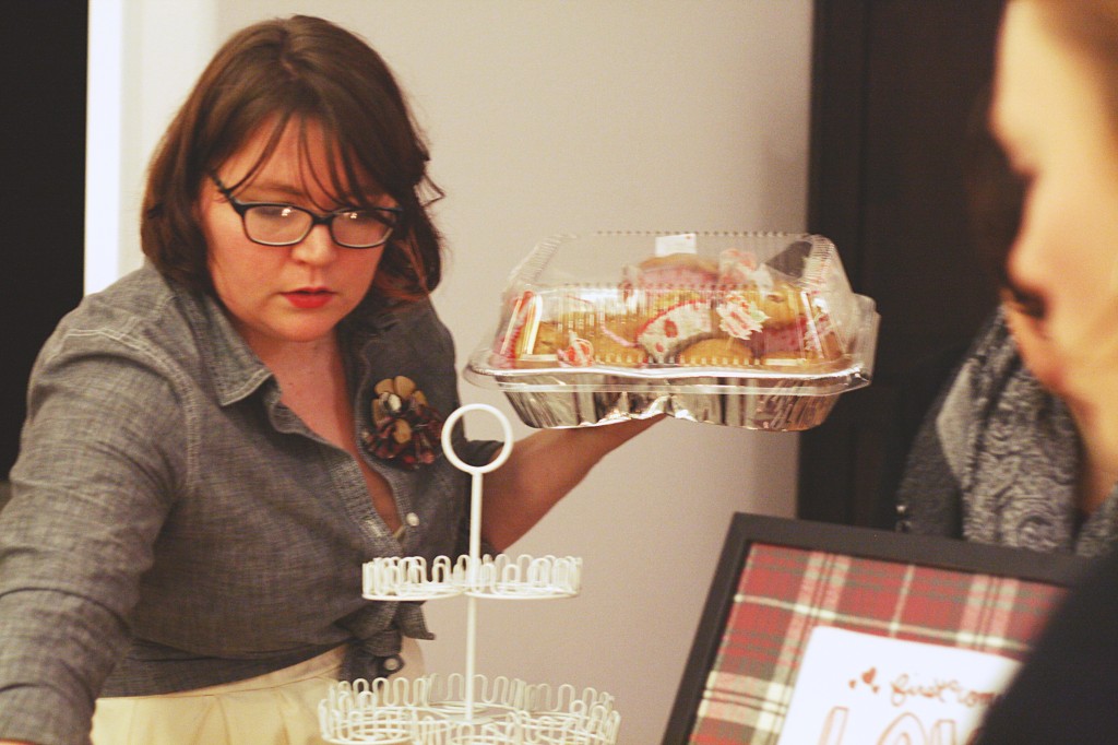 Putting out desserts that guests brought for our Valentine's Day Potluck. Photo by Motormouth Studios