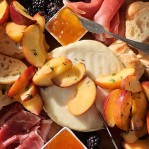 Grilled Brie with Peaches, Prosciutto,Blackberries, and Bread