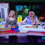 Photo of TV with shot of Hannah the host of Afternoon Live on KATU with Jenni Bost of A Well Crafted Party behind a party set up for a summer pool party