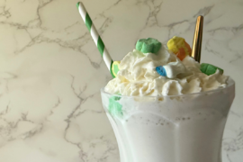 lucky charms on whipped cream topped shake